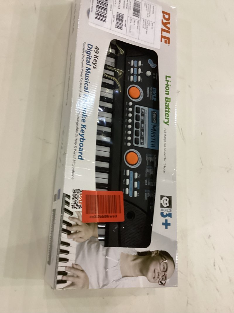 Condition photo showing New/Like New for Pyle Electric Keyboard Piano, 49-Key Digital Karaoke Piano with Stereo Speakers, Rechargeable Battery & Wired Microphone, Compact and Portable Keyboard Design, 21" x 7" x 2"