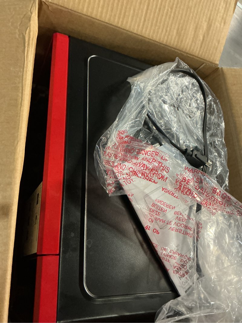 Condition photo showing Good Condition for mainstays 0.7 cu ft countertop microwave oven, 700 watts, red, new
