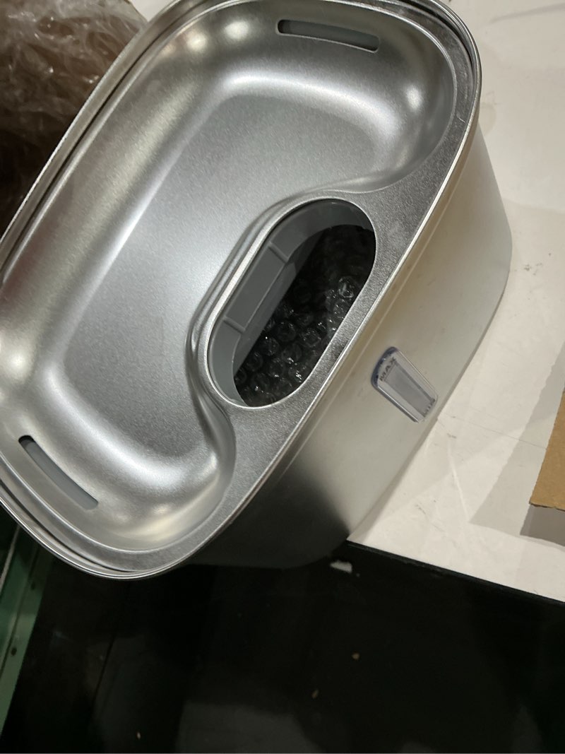Condition photo showing As Is for vacqustainless steel dog & cat water fountain with filtration system & silent pump
