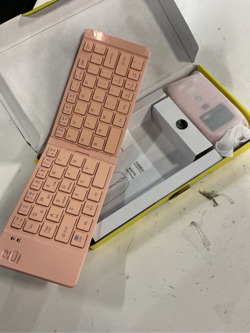 Condition photo showing Good Condition for mini rechargeable foldable bluetooth keyboard and mouse combo, portable (sync up to 3 devices), ultra-slim travel folding keyboard for iphone ipad mac android windows ios?pink?