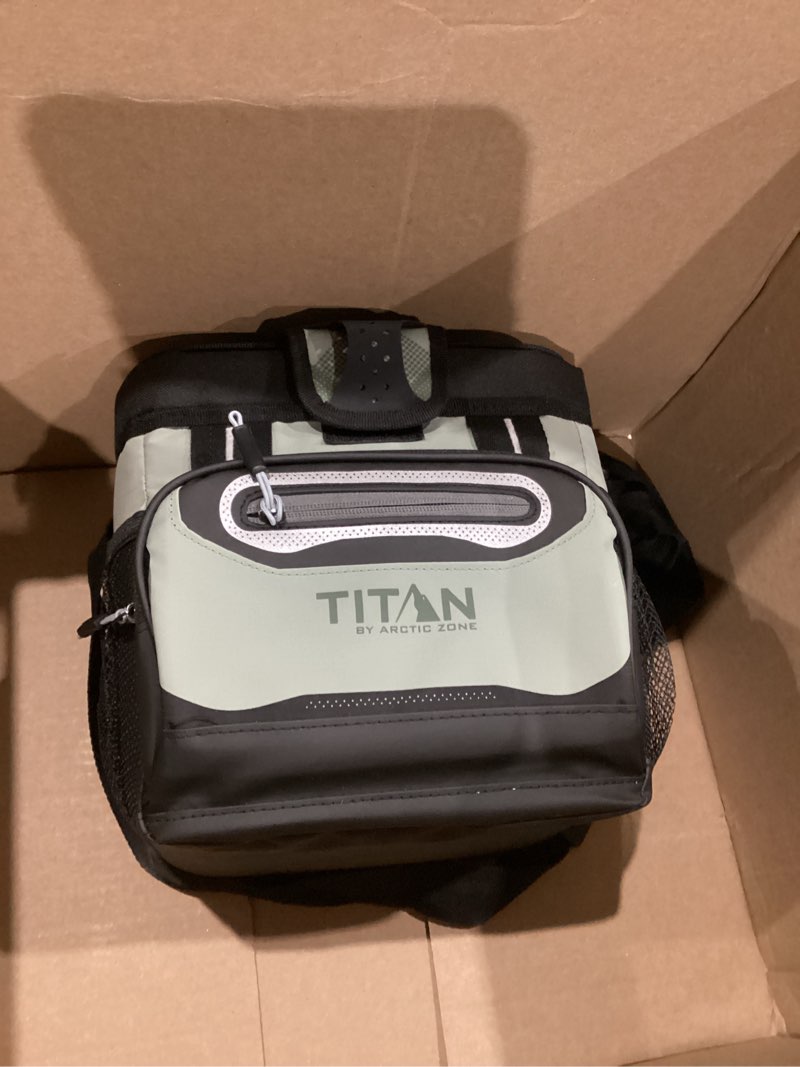 Condition photo showing As Is for Titan by Arctic Zone Deep Freeze Cooler - Zipperless Hardbody Cooler - Deep Freeze Insulation, HardBody Liner, and SmartShelf 9 Can Seagrass