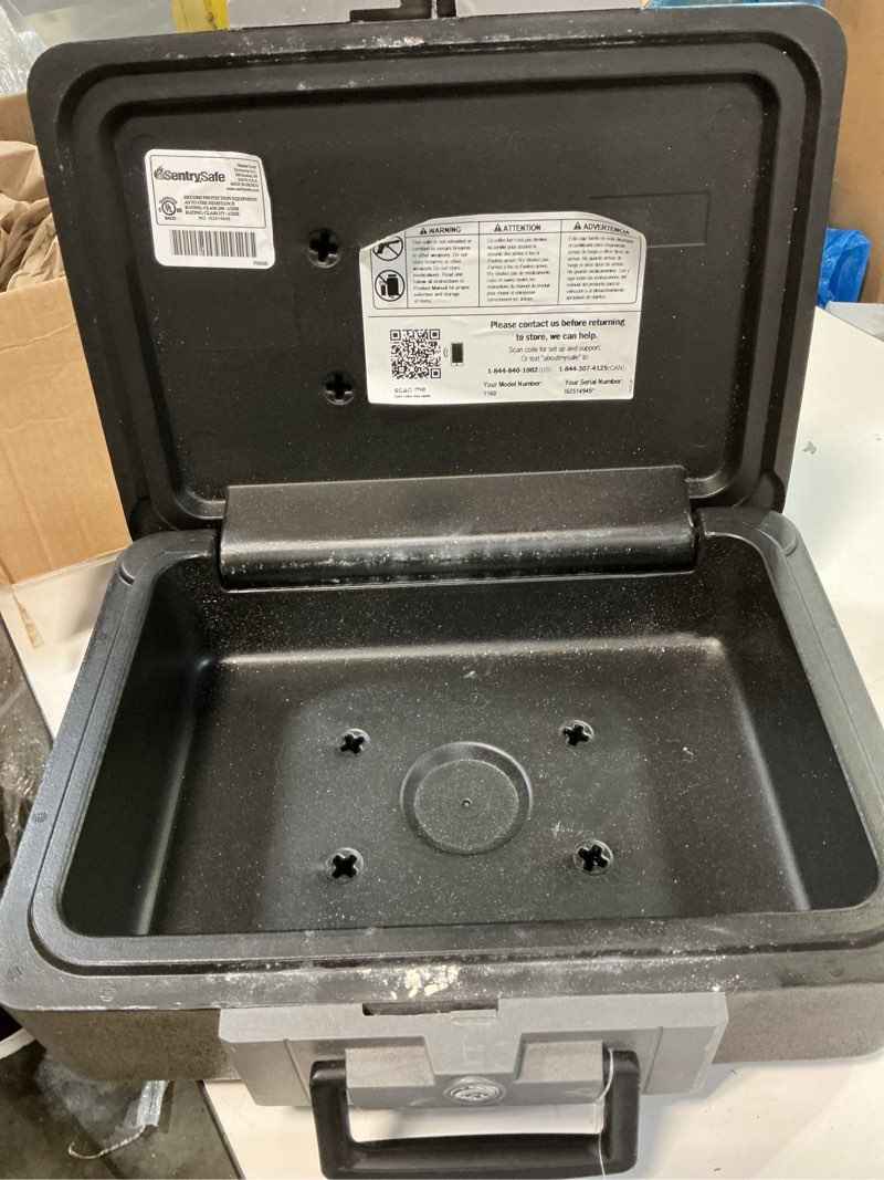 Condition photo showing As Is for (without a key)sentrysafe dark gray fireproof and waterproof safe with key lock, chest lock box with carrying handle for travel, 0.28 cubic feet, 6.6 x 15.4 x 14.3 inches, cfw20201 1 hr. fireproff, no lid straps