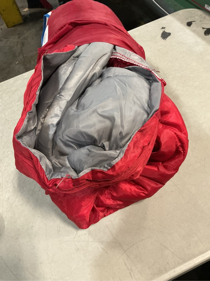 Condition photo showing Good Condition for ozark trail 50-degree warm weather red sleeping bag, 33"x75"