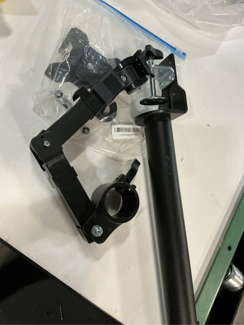 Condition photo showing As Is for Amazon Basics Single Computer Monitor Stand with Tilt and Rotation, Height Adjustable VESA Desk Arm Mount, Steel, 30 inches, Black