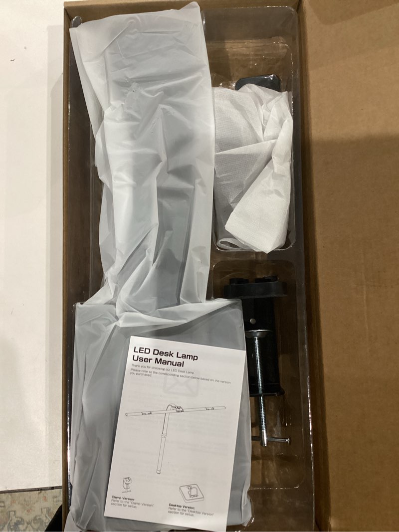 Condition photo showing Good Condition for ONEMIX 42" LED Desk Lamp with Clamp, Architect Desk Light with Remote, Adjustable 4-Segment Bar, 1800LM Bright, Eye-Caring Desk Lamp for Home Office, Reading, Study, Dual Monitors, Workbench (Black)