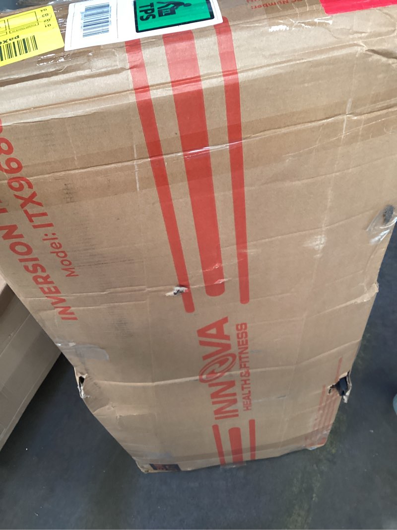 Condition photo showing As Is for innova health and fitness inversion table with adjustable headrest, reversible ankle holders, and 300 lb weight capacity premium