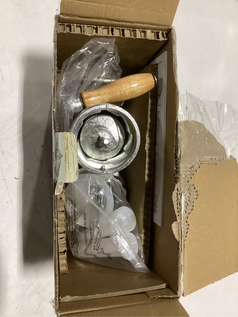 Condition photo showing As Is for mossy oak heavy-duty manual meat grinder & sausage stuffing kit with 2 grinding plates and c-clamp