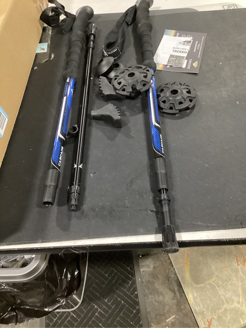 Condition photo showing As Is for cascade mountain tech lightweight aircraft-grade aluminum trekking poles with extended down grip plus tip kit blue (eva grip) twist lock trekking poles