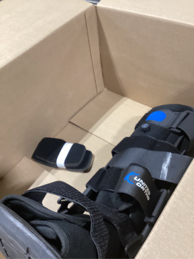 Condition photo showing Good Condition for united ortho short air cam walker fracture boot, large, black black large boot
