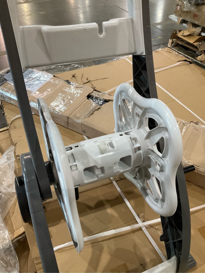 Condition photo showing As Is for hose reel