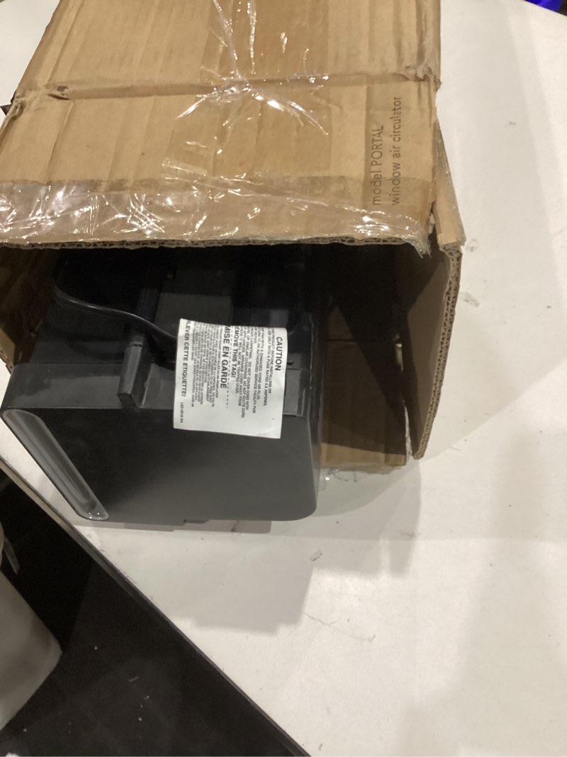 Condition photo showing As Is for vornado portal® window fan with 3 speeds, reversible exhaust mode, weather resistant, window fan for kitchen, bedroom, home, low profile, black