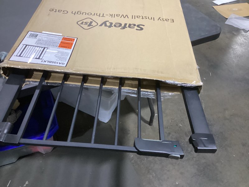 Condition photo showing Good Condition for Safety 1st Easy Install 28'' Walk Thru Gate, Fits Between 29'' and 38'', Black, 1-Pack,(GA105CBLK) 1-Pack 29" to 38" Wide x 28" Tall Black