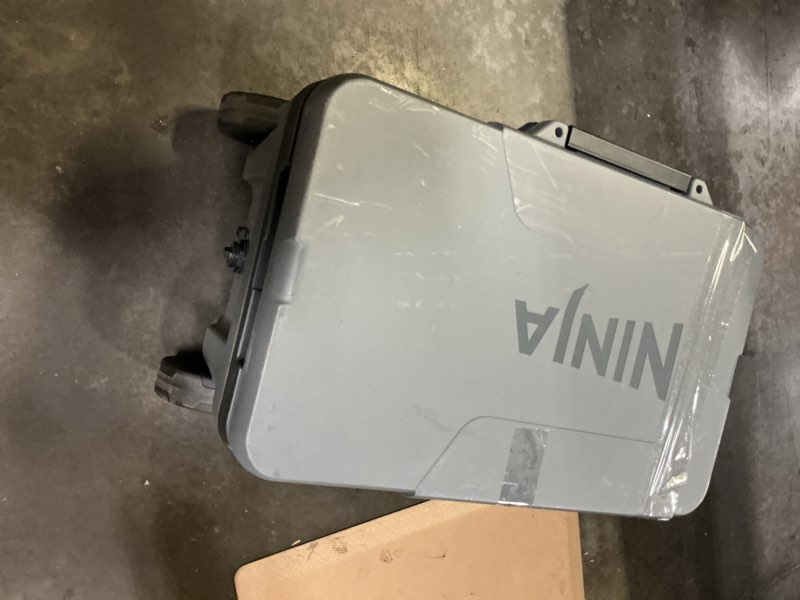 Condition photo showing As Is for ninja outdoor frostvault 45qt wheeled cooler with cold dry zone - slate gray: rolling coolers