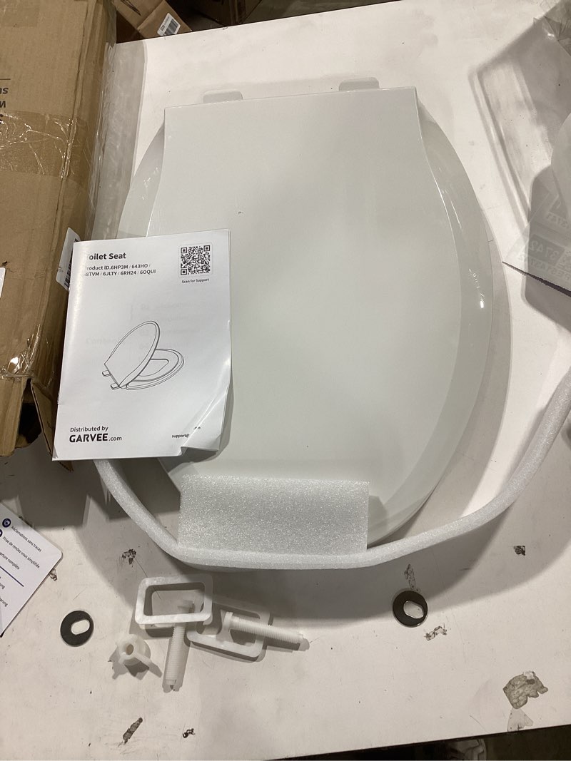 Condition photo showing Good Condition for 19" elongated toilet seat with built-in potty training seat, soft quiet-close lid with non-slip design, magnetic kids seat in white, easy to install and clean elongated (19?) white, with toddler seat