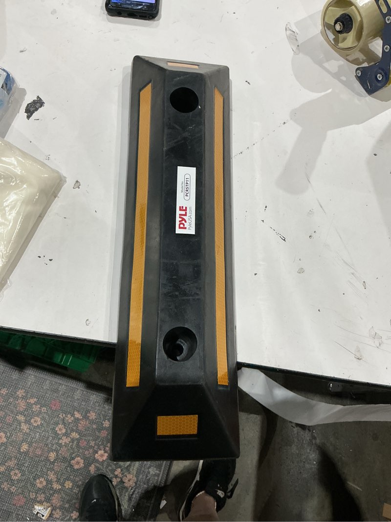 Condition photo showing As Is for pyle - vehicle wheel stop - car & truck parking curb tire stop, heavy duty rubber parking tire block