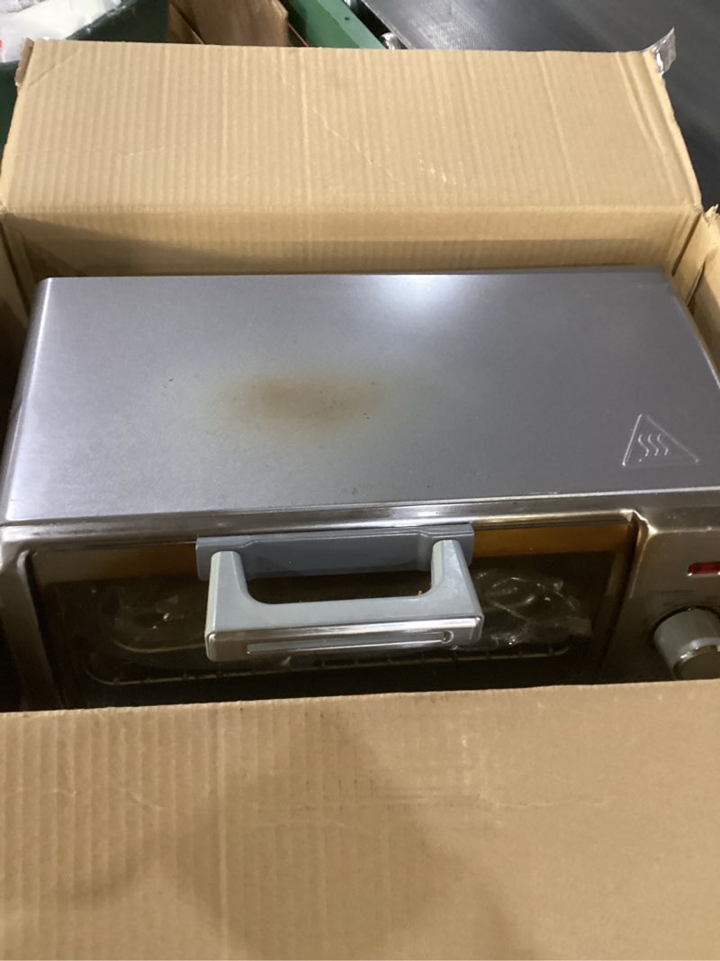 Condition photo showing New/Like New for BLACK+DECKER Crisp ‘N Bake Air Fry 4-Slice Toaster Oven  Silver & Black  Fits 9 Inch Pizza  .35 Cubic Feet