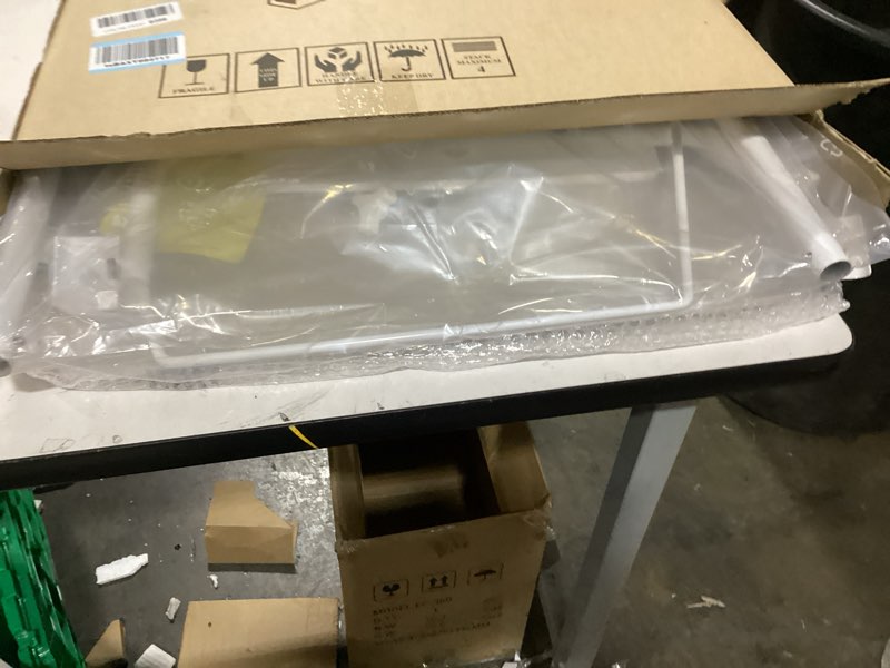 Condition photo showing New/Like New for FoldWise Upgraded Folding TV Tray Table - Extra Large & Sturdy Laptop Table for Couch, Height & Angle Adjustable Desk for Dinner, Work & TV - Includes Footrest, Cup Holder, iPad Holder & Edge Stopper (White) - Bright Wood