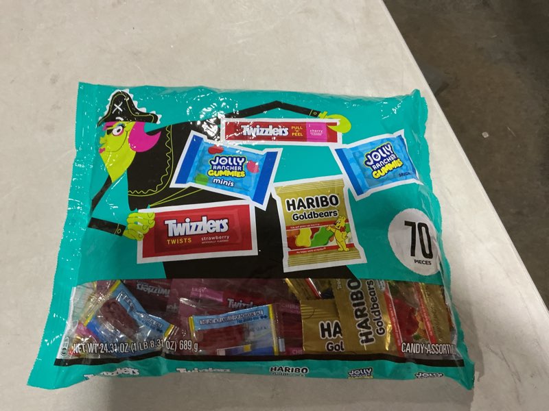 Condition photo showing New/Like New for Jolly Rancher HARIBO, JOLLY RANCHER and TWIZZLERS Assorted Fruit Flavored, Halloween Candy Bag, 24.31 oz (70 Pieces) Assorted 70 Count (Pack of 1)