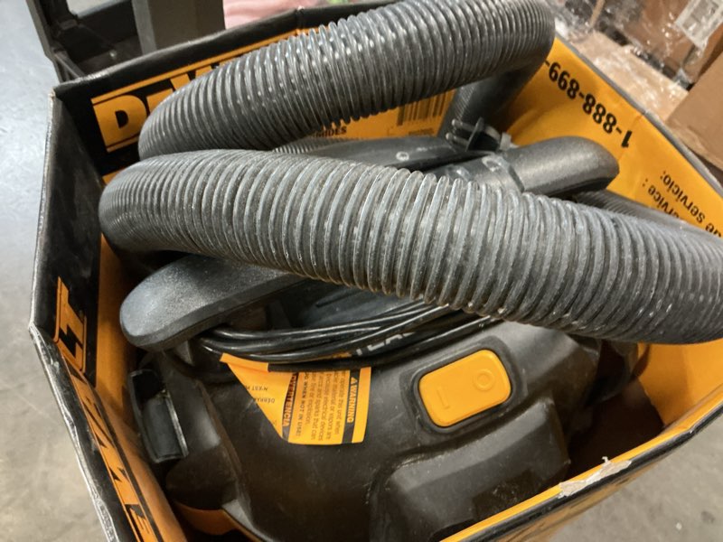Condition photo showing As Is for dewalt stealthsonic quiet 6-gallons 4-hp corded wet/dry shop vacuum with accessories included