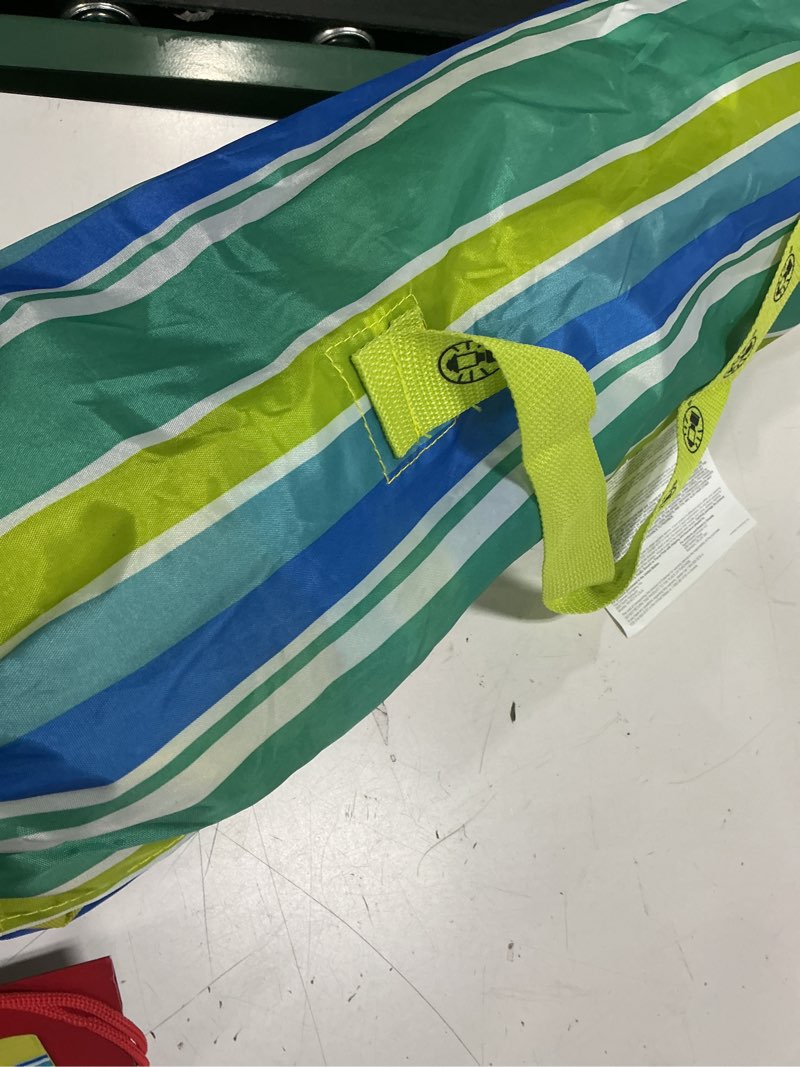 Condition photo showing As Is for coleman utopia breeze lightweight beach chair with cup holder, comfortable portable outdoor chair with carry bag, supports up to 250lbs, great for beach & yard