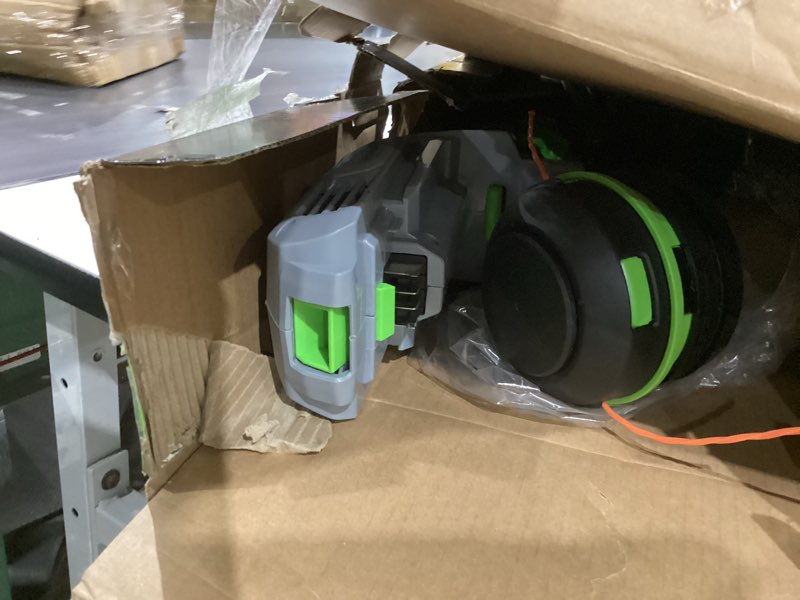Condition photo showing As Is for ego powerload 56-volt 15-in telescopic shaft battery string trimmer 2.5 ah (battery and charger included)