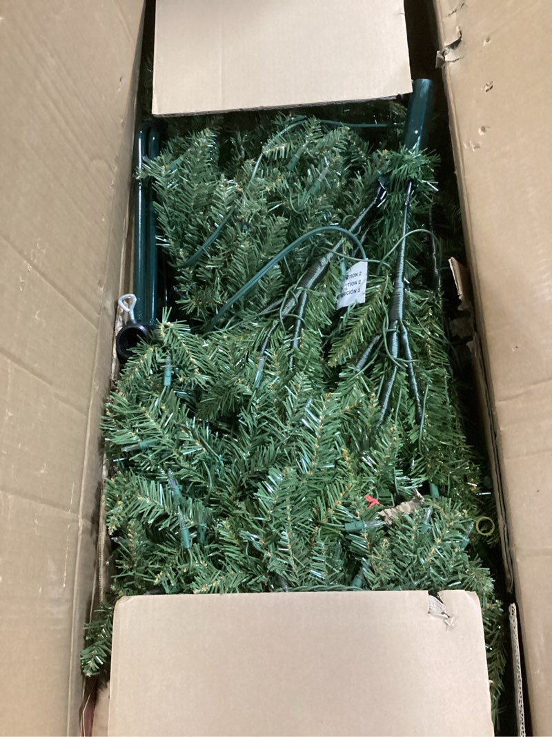 Condition photo showing As Is for National Tree Company 6.5 ft Pre-Lit Dunhill Fir Artificial Christmas Tree, 650 Clear Lights, 1,838 Tips, Includes Stand, Green 6ft 6in Tree