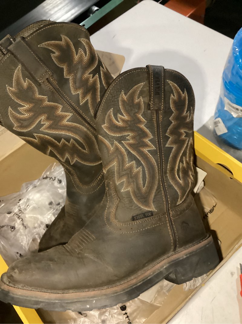 Condition photo showing As Is for WOLVERINE Men's Rancher Waterproof Steeltoe Square Toe 10in Wellington Work Boot 9 X-Wide Black/Brown