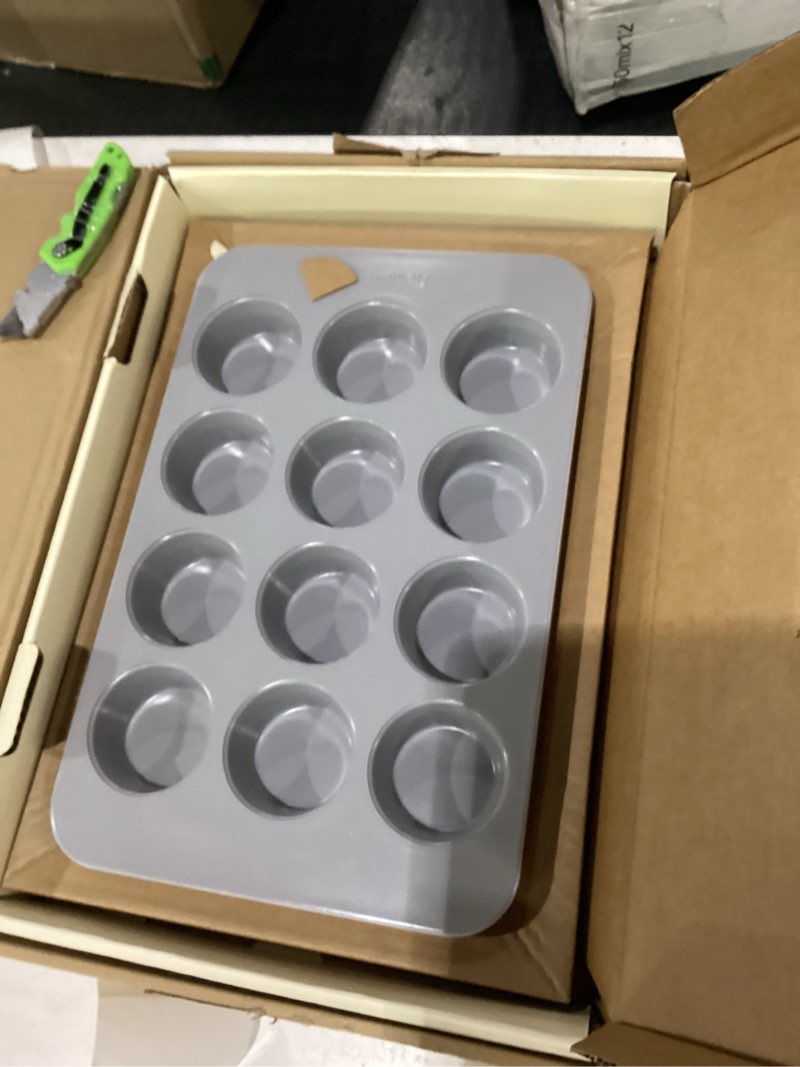 Condition photo showing New/Like New for caraway non-stick ceramic 12-cup muffin pan - naturally slick ceramic coating - non-toxic, ptfe & pfoa free - perfect for cupcakes, muffins, and more - cream