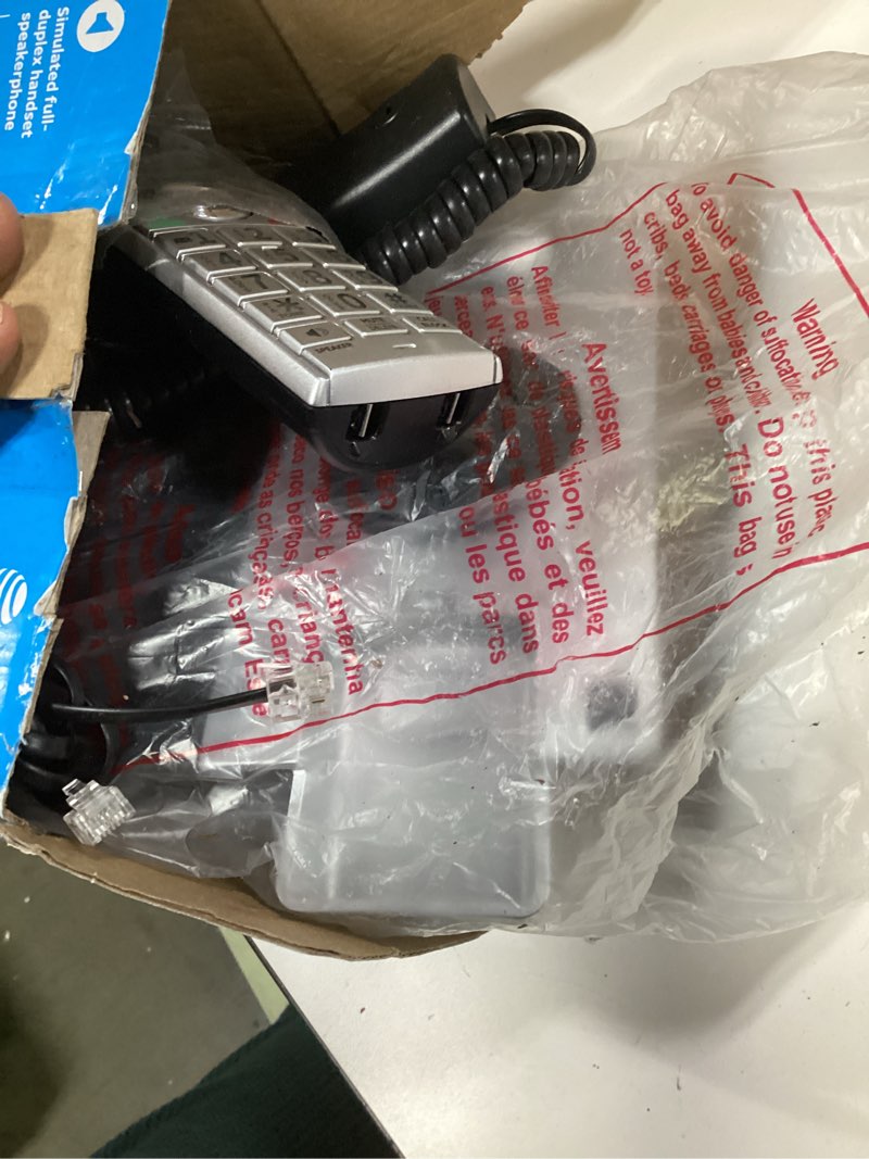 Condition photo showing As Is for AT&T CL84107 DECT 6.0 Expandable Corded/Cordless Phone with Smart Call Blocker, Black/Silver with 1 Handset 1 Handset Silver/Black Corded /Cordless