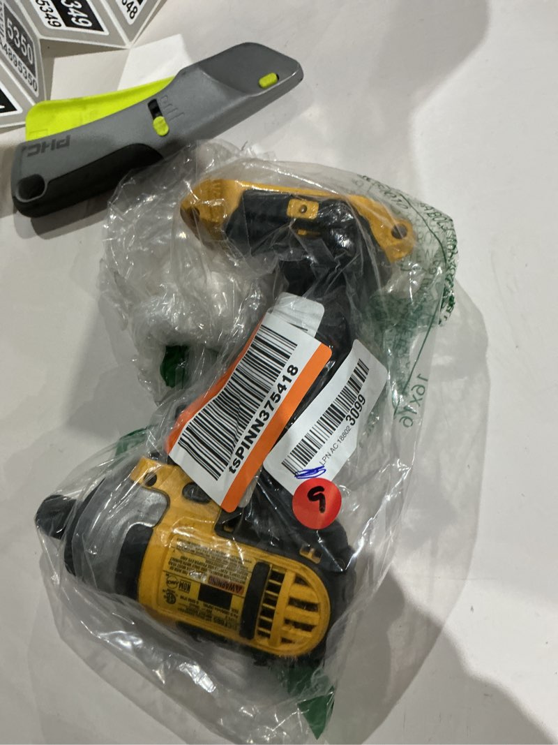 Condition photo showing As Is for dewalt 20v max impact driver, 1/4 inch, battery and charger included (dcf787d1)