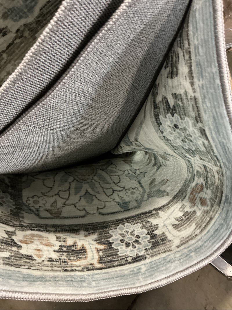 Condition photo showing item condition for (similar product, unknow size) Area rug Isabella