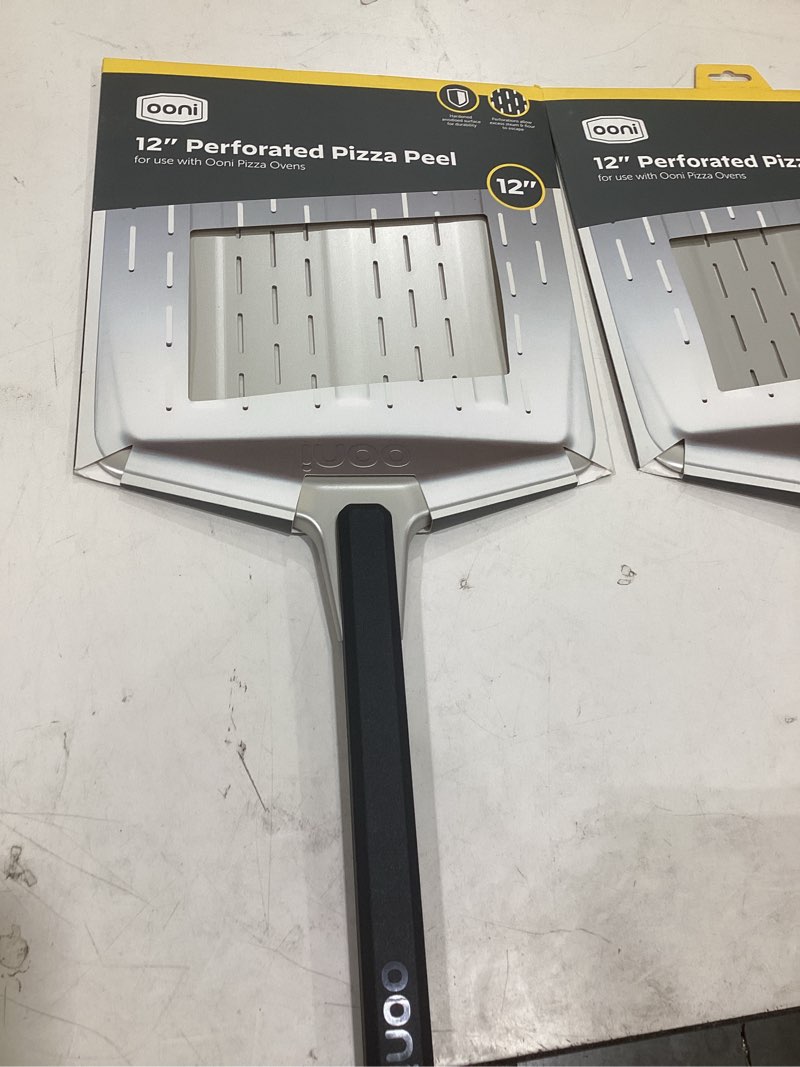 Condition photo showing New/Like New for ooni 12” perforated pizza peel – aluminum metal pizza peel 12 inch, pizza spatula paddle, lightweight pizza turning peel with long handle, pizza oven accessories, pizza tools, rectangle pizza turner