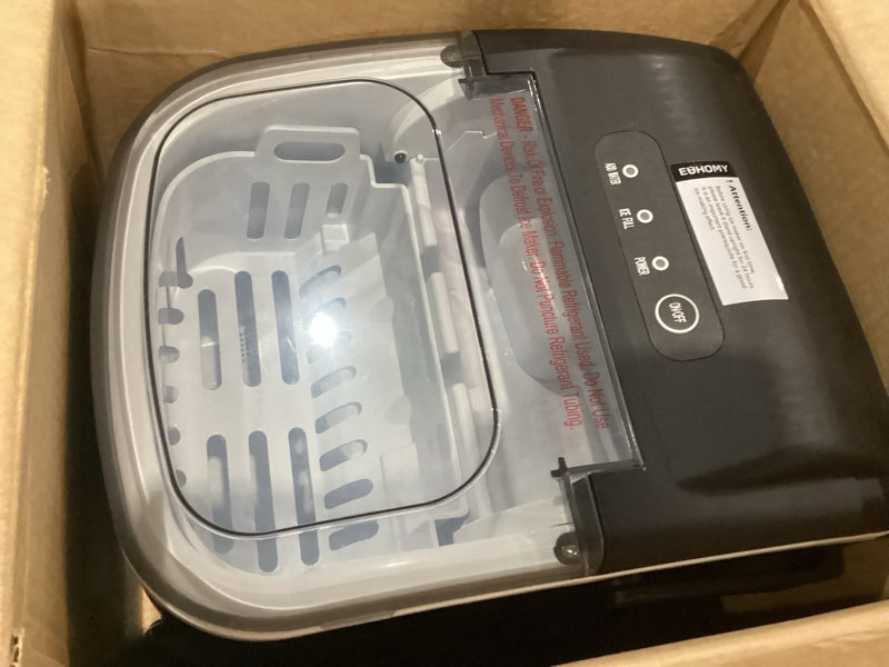 Condition photo showing Good Condition for euhomy countertop ice maker machine with handle, 26lbs in 24hrs, 9 ice cubes ready in 6 mins, auto-cleaning portable ice maker with basket and scoop, for home/kitchen/camping/rv. (black)