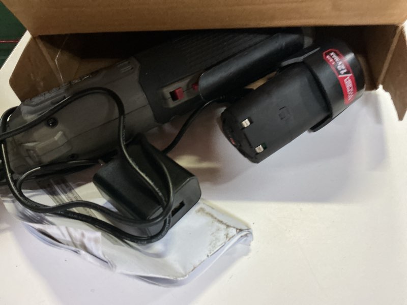 Condition photo showing As Is for hyper tough 12v ratchet wrench with 7-piece socket set, holiday gift