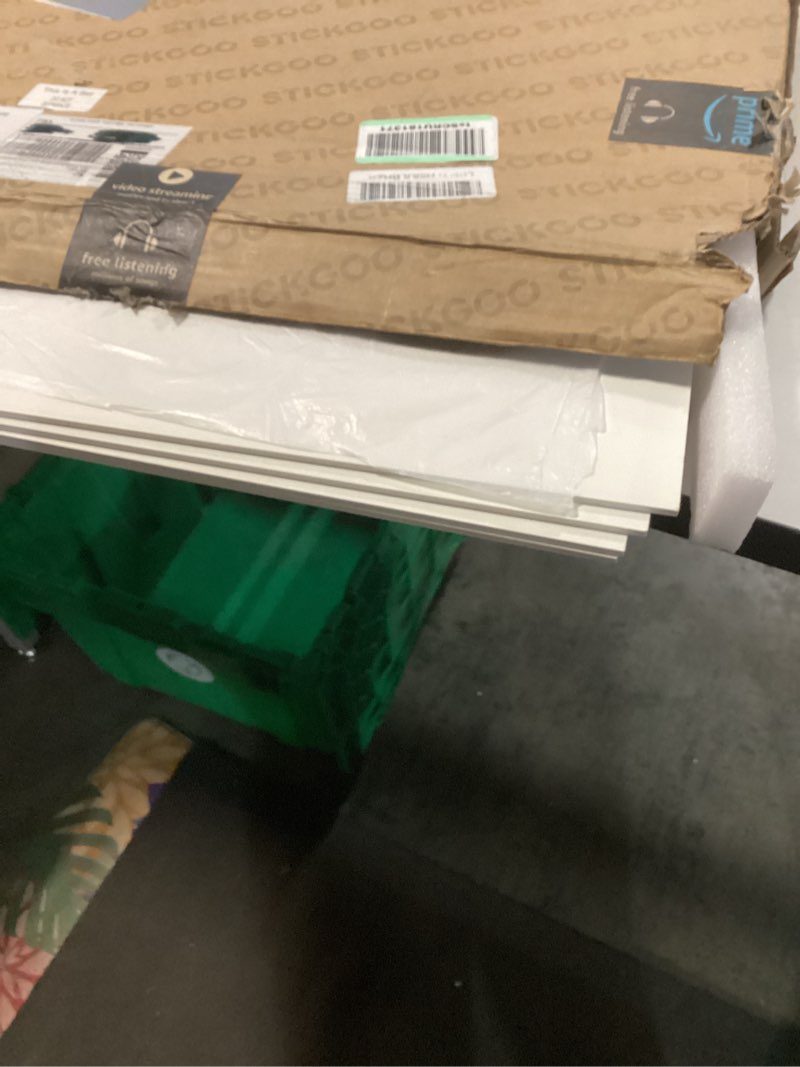 Condition photo showing Good Condition for STICKGOO Smooth Drop Ceiling Tiles 2ft x 2ft, PVC Ceiling Tile 24 x 24in - Waterproof, Fire-Rated to Prevent Breakage - Package of 12 Tiles Cover 48 Sq. Ft, White White 12 Pack of 2ft x 2ft