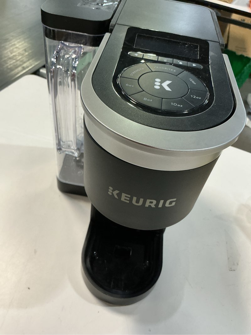 Condition photo showing As Is for keurig k-supreme single serve k-cup pod coffee maker, multistream technology, 4 brew sizes, 66oz dual-position removable reservoir, black black coffee maker