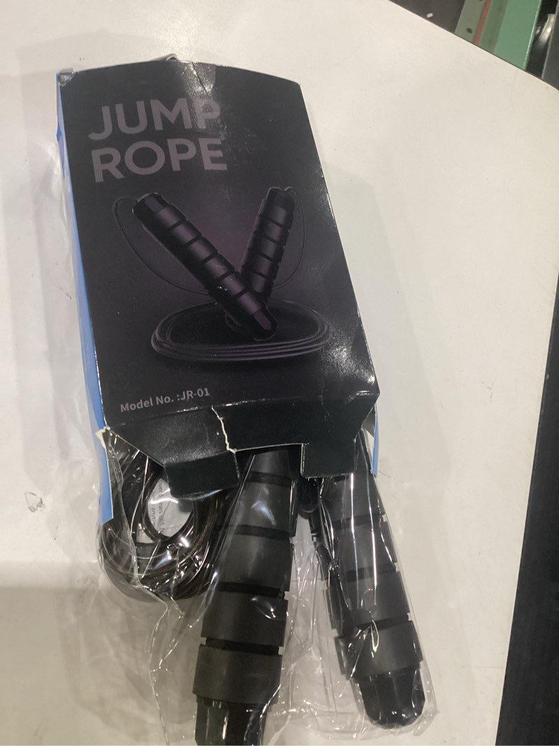 Condition photo showing Good Condition for jump rope, tangle-free rapid speed jumping rope cable with ball bearings for women, men & kids, adjustable steel jump rope with foam handles for home gym exercise fitness workout equipment & slim body black