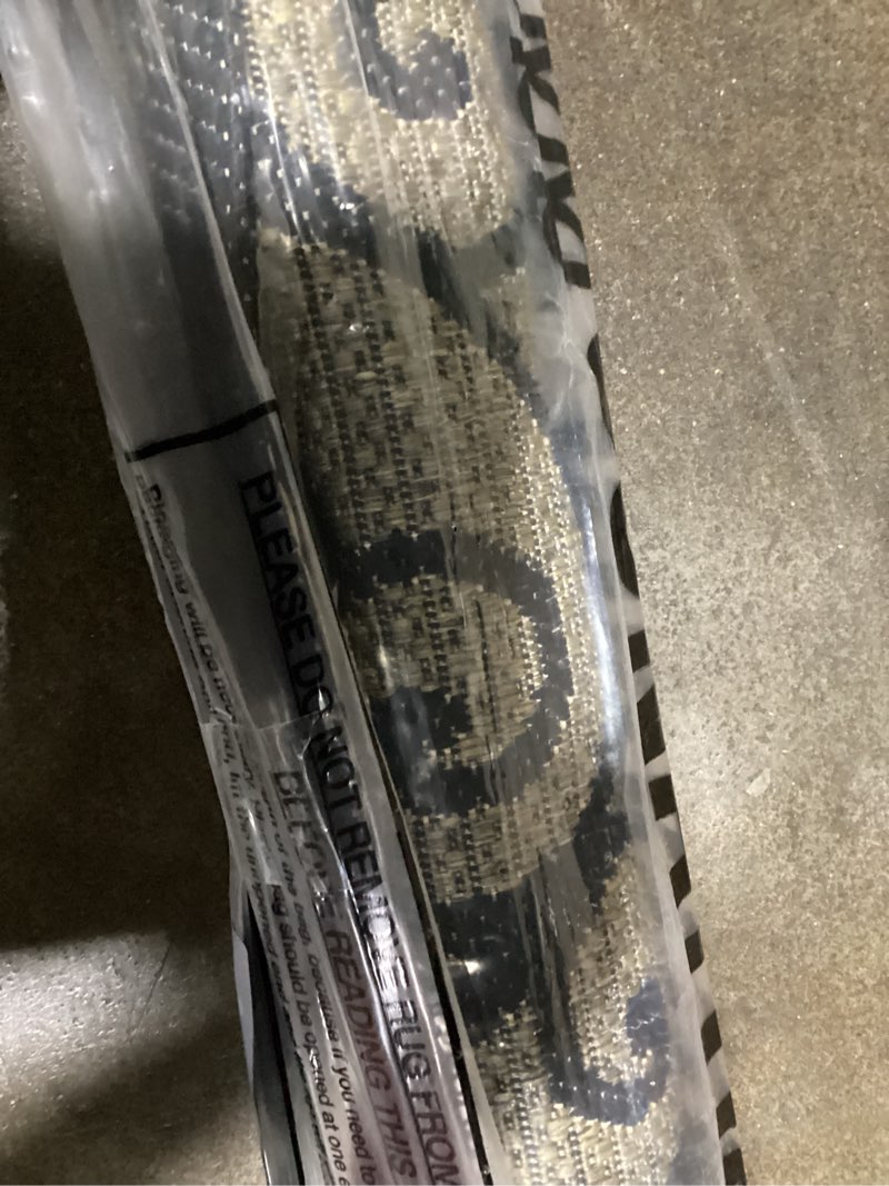 Condition photo showing New/Like New for jonathan y smb107a-8 madrid vintage filigree textured weave indoor/outdoor black/khaki 8 ft. x 10 ft. area-rug, classic,easy-cleaning,hightraffic,livingroom,backyard, non shedding