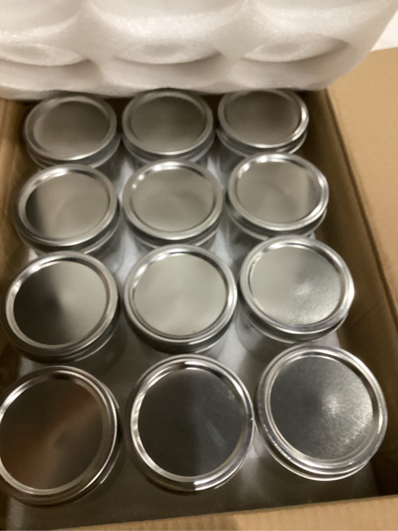 Condition photo showing Good Condition for 12 Pack 16 oz Wide Mouth Clear Mason Jars with Silver Metal Lids, Canning Jars for Overnight Oats, Food Storage, Dry Food, Snacks, Candies and More