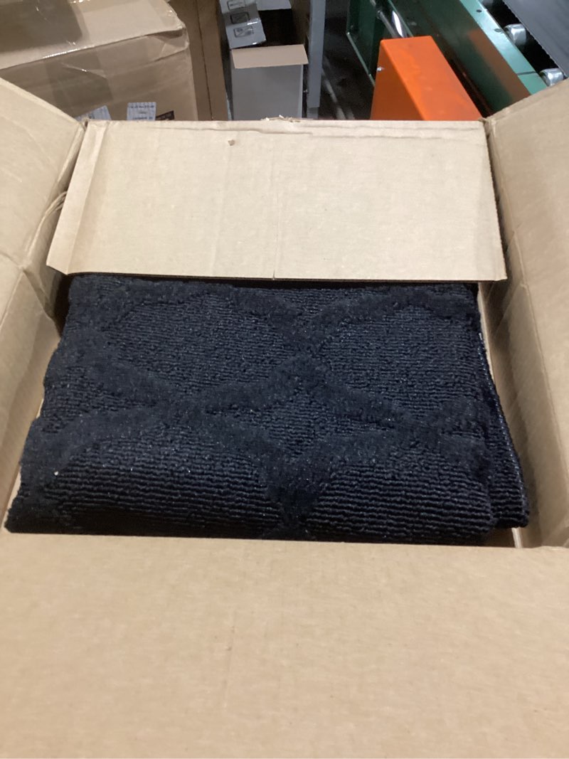 Condition photo showing Good Condition for Garland Rug Sparta Non Slip Polypropylene 3 Ft. X 5 Ft. Black Area Rug- Ideal for Living Rooms & Hallways, Stylish & Durable for High Traffic Areas Black 3' x 5' (Rectangular)