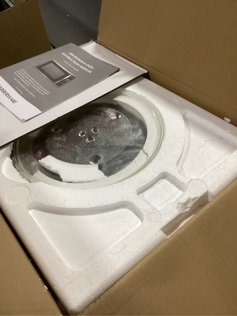 Condition photo showing Good Condition for Farberware 1.1 Cu. Ft. Countertop Microwave Oven – 1000 Watts Power, Auto Cook Settings, Defrost, Easy Clean and Child Safety Lock - Stainless 1.1 Cu. Ft. Stainless Steel