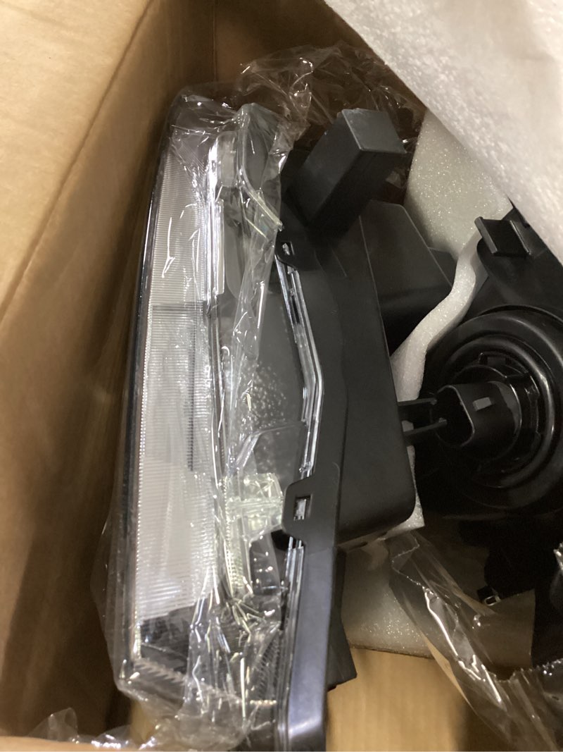 Condition photo showing New/Like New for headlight assembly compatible with nissan 2009-2021 frontier 4-door sedan chrome housing amber reflector halogen headlights driver and passenger sides (bulbs not included)?w/o bulbs?