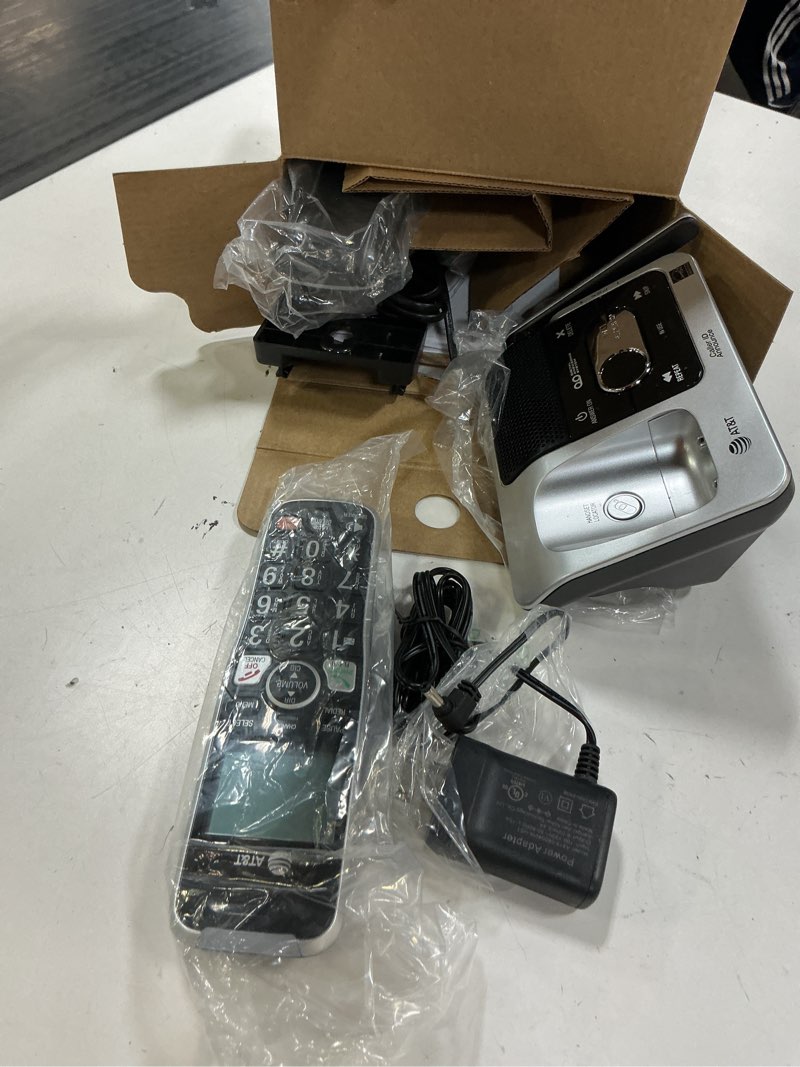 Condition photo showing As Is for at&t bl102-2 dect 6.0 2-handset cordless phone for home with answering machine, call blocking, caller id announcer, audio assist, intercom, and unsurpassed range, silver/black 2 handset phone