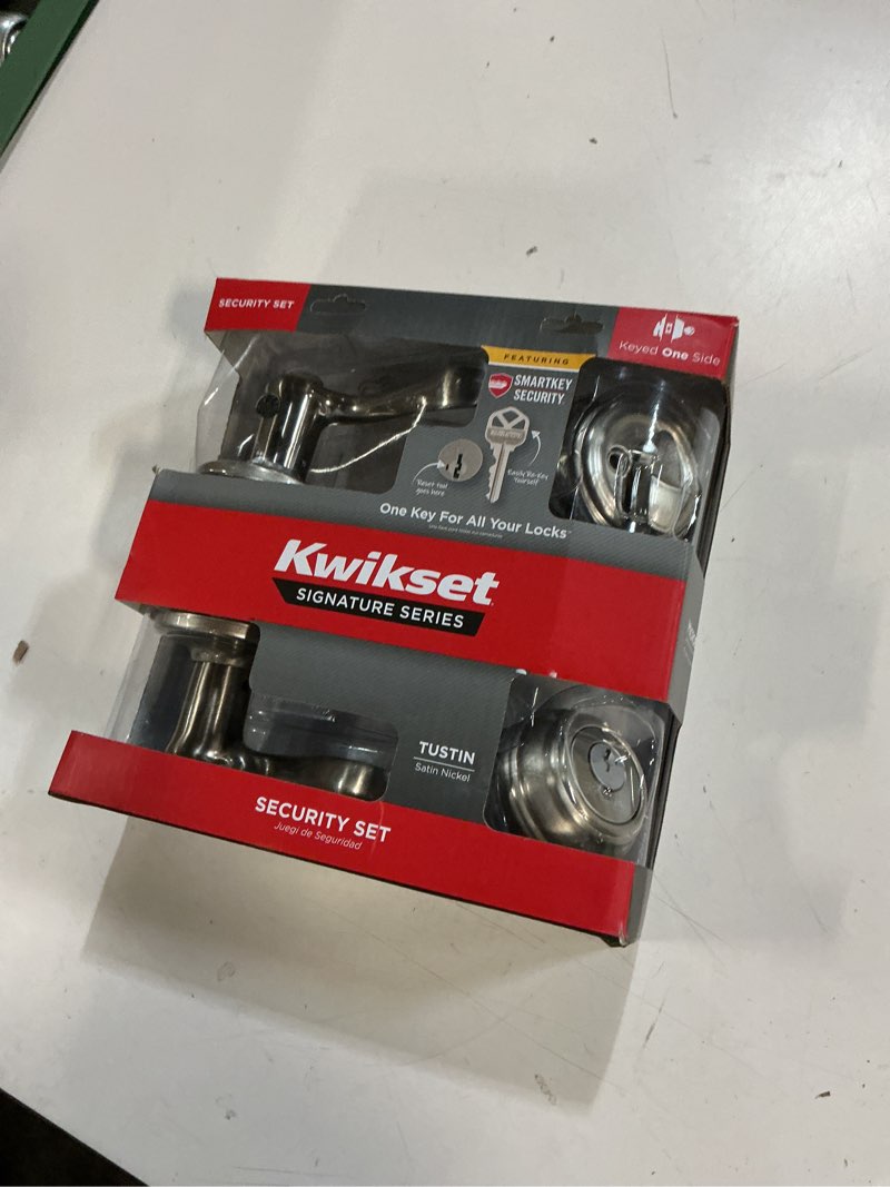 Condition photo showing As Is for tustin satin nickel exterior entry door handle and single cylinder deadbolt combo pack featuring smartkey security