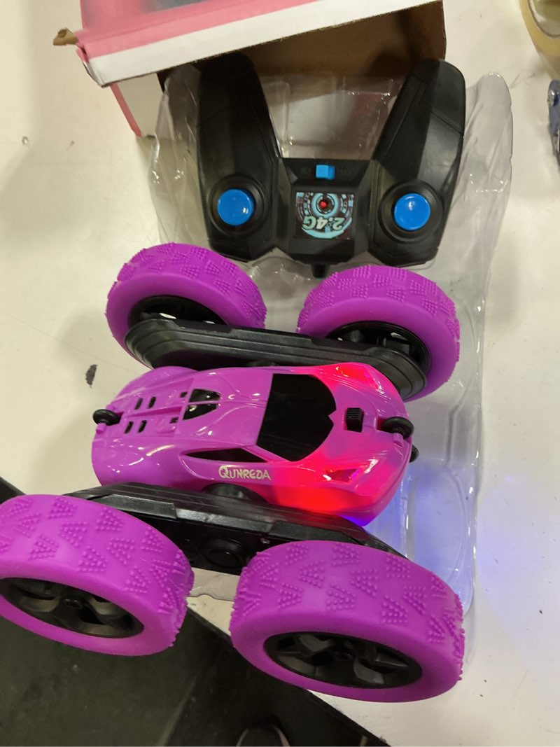 Condition photo showing Good Condition for rc cars, purple remote control car for girls, 2.4 ghz double sided rc stunt car 360° rotating remote control crawler with headlights car toys for 6 7 8 9 10 11 12 girls birthday gift