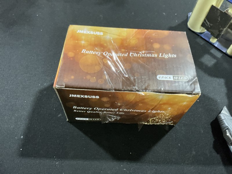Condition photo showing Good Condition for JMEXSUSS 4 Pack 50 LED Red Christmas Lights Battery Operated, Each 16.5ft Red String Lights with Tim