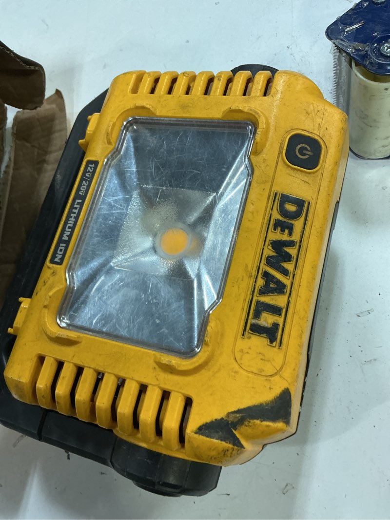 Condition photo showing As Is for dewalt 20v max 2000 lm led battery handheld compact task light