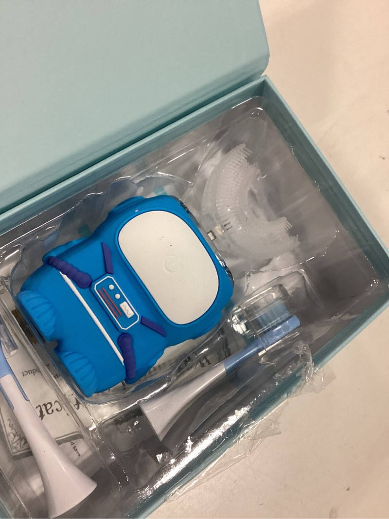 Condition photo showing Good Condition for rexcodar ultrasonic kid's u-shaped electric toothbrush, ipx7 waterproof, five cleaning modes,cartoon astronaut, 60s smart reminder (6-12 age (blue))