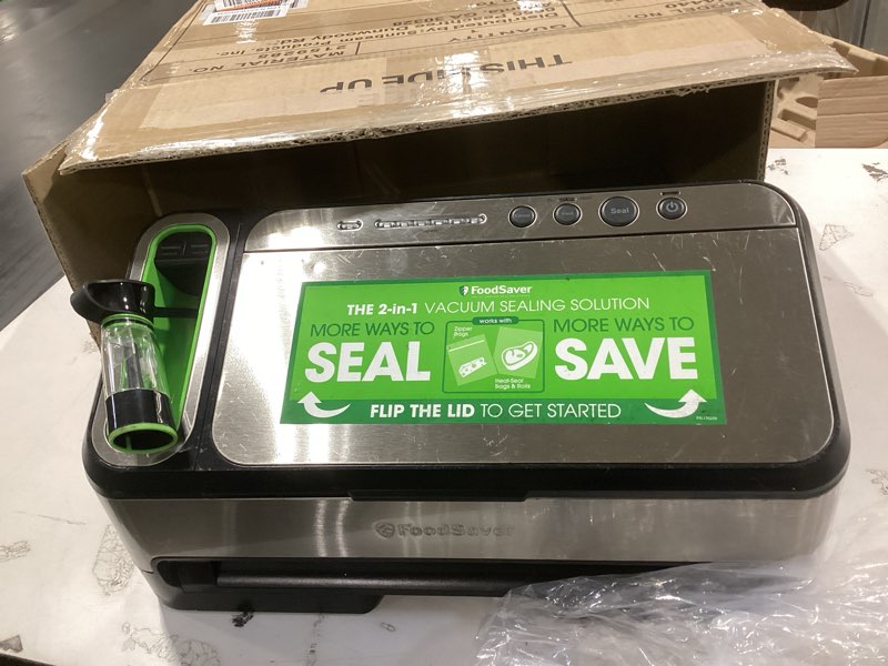 Condition photo showing As Is for FoodSaver V4400 2-in-1 Vacuum Sealer Machine with Automatic Vacuum Sealer Bag Detection and Starter Kit Machine & Starter Kit