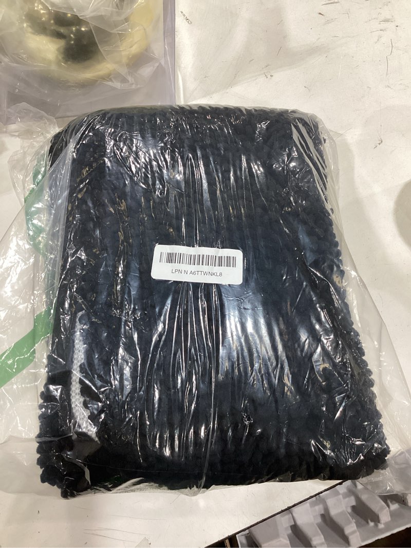 Condition photo showing New/Like New for OLANLY Bathroom Rugs 36x24, Extra Soft Absorbent Chenille Bath Rugs, Rubber Backing Quick Dry, Machine Washable Bath Mats for Bathroom Floor, Tub and Shower, Home Decor Accessories, Black 36" x 24" Black